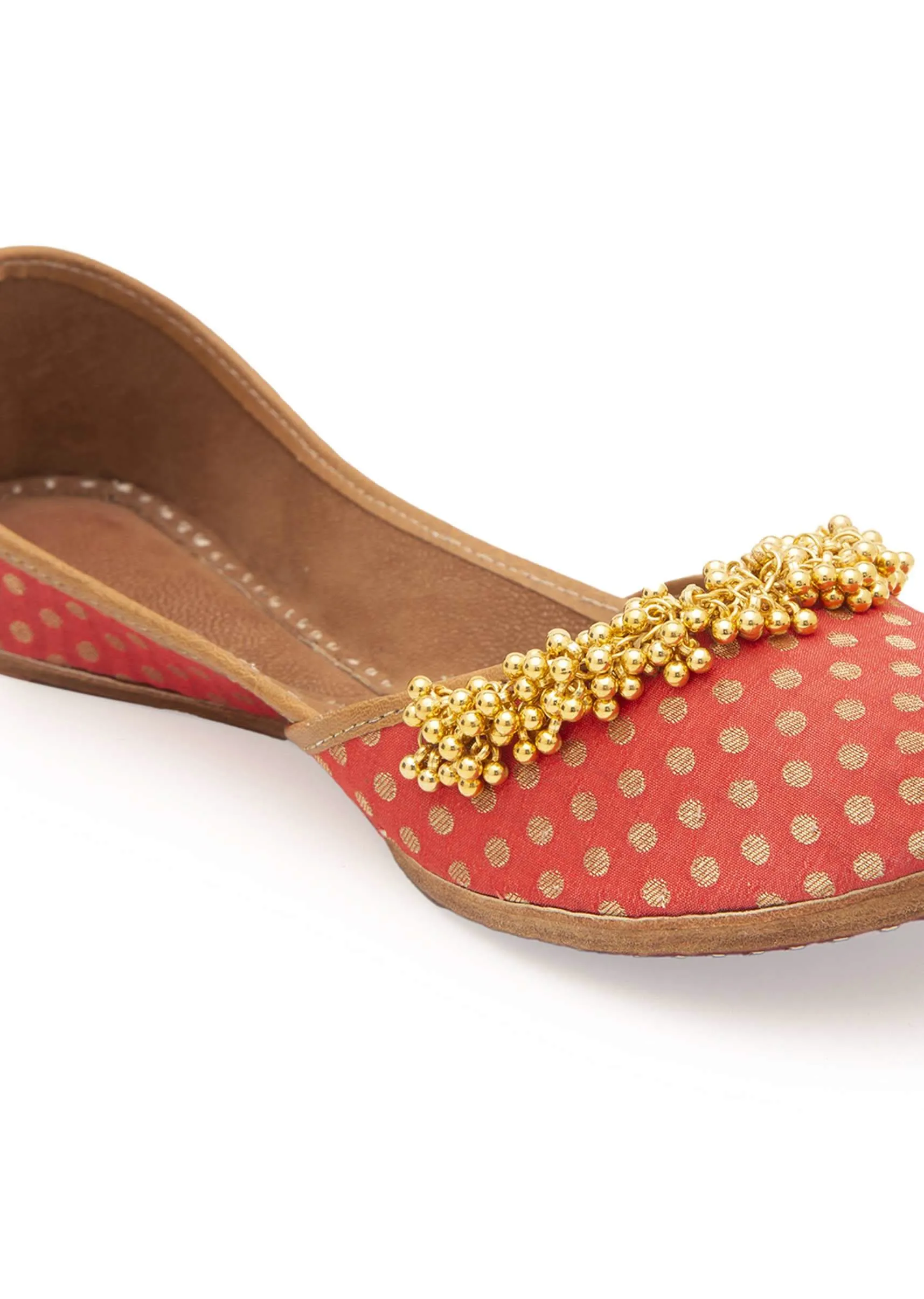 Peach Polka Dots Print Juttis In Silk With Ghungroo Embellishment And Leather Underlining